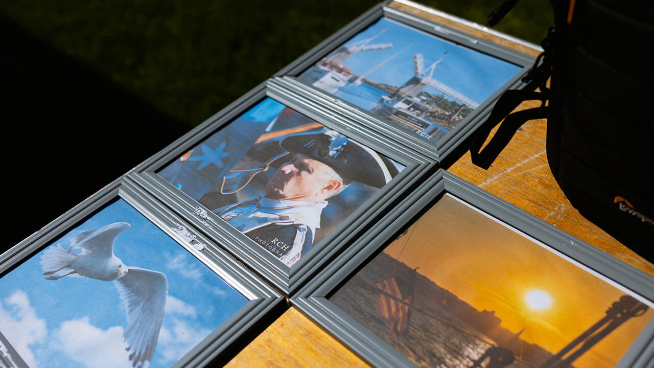 Ryan Holden sells his photographs during a pop-up-shop event