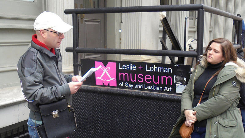Vince Contrucci talks to a student outside the Leslie Lohman Gay and Lesbian Art Gallery
