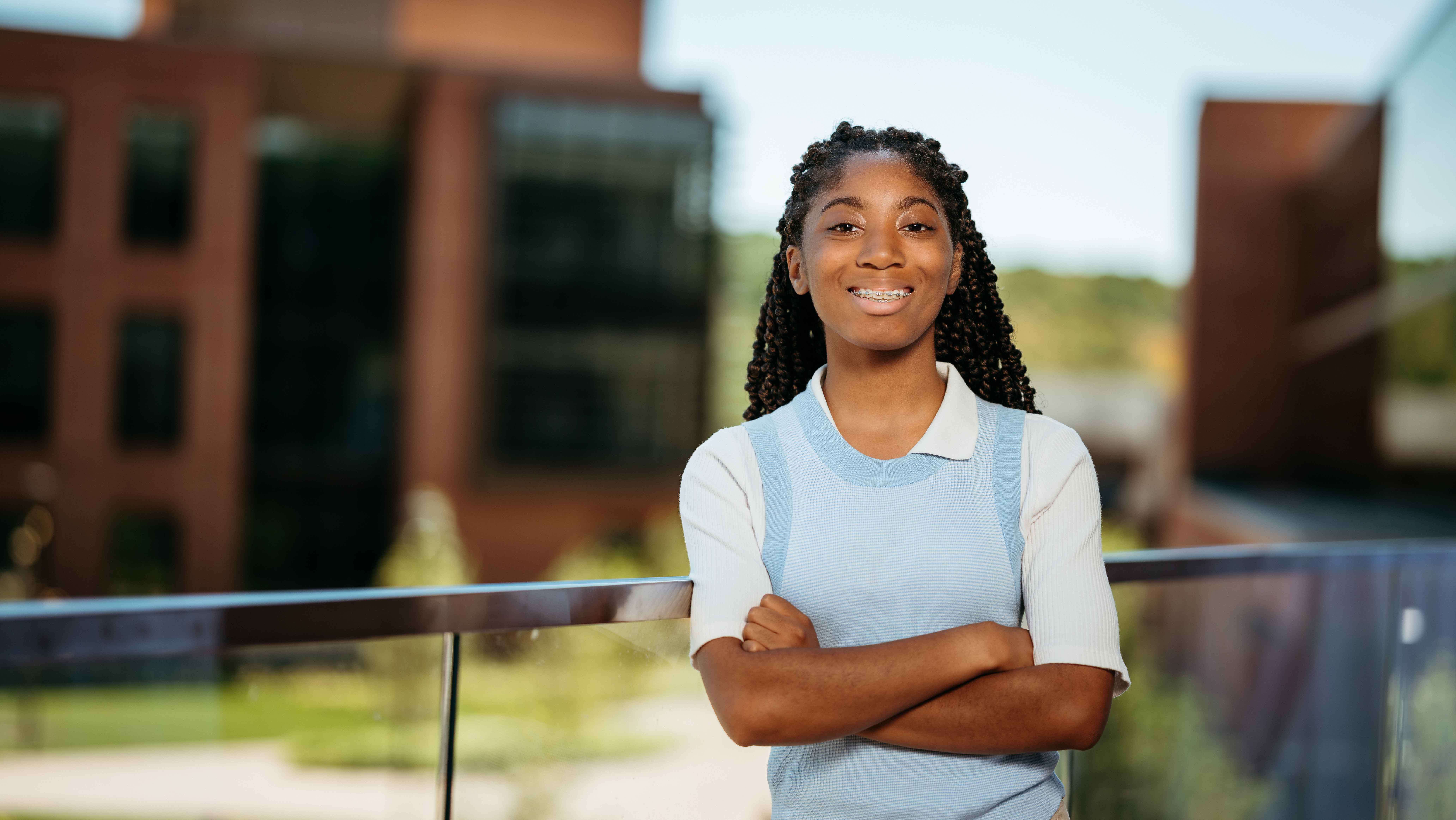 Dae'ja Josey, a Sawhney Leadership fellow, poses for a portrait on the balcony of the School of Business on the South Quad.