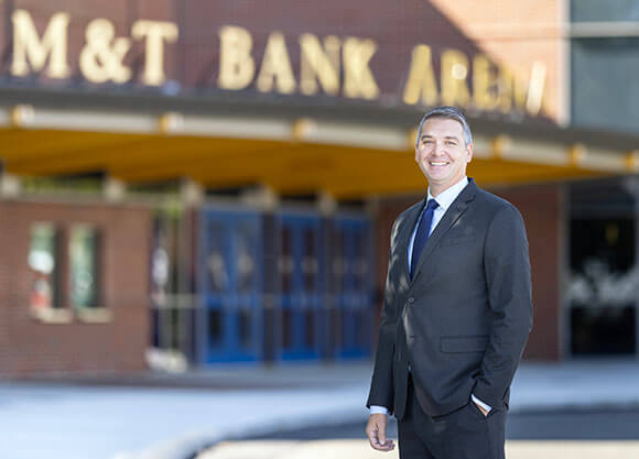 Eric Grgurich in front of the M&T Bank Arena