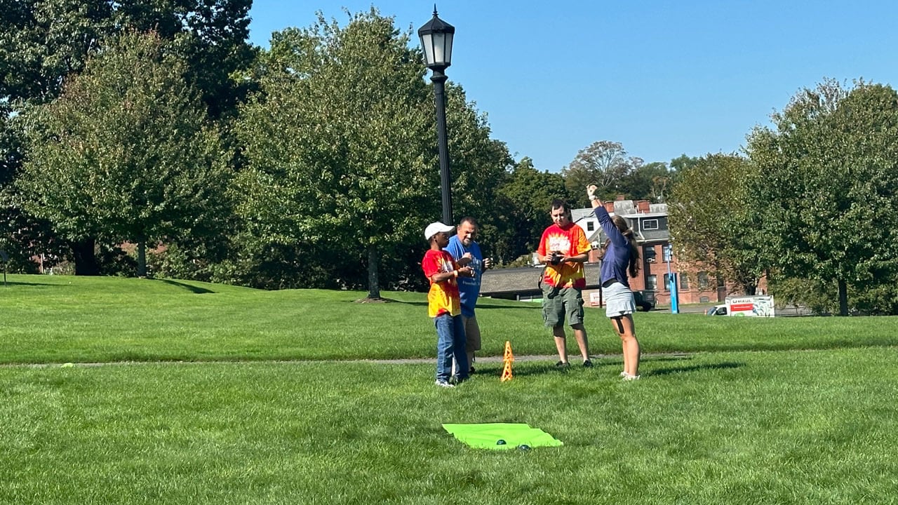 A group of athletes work out in a field.