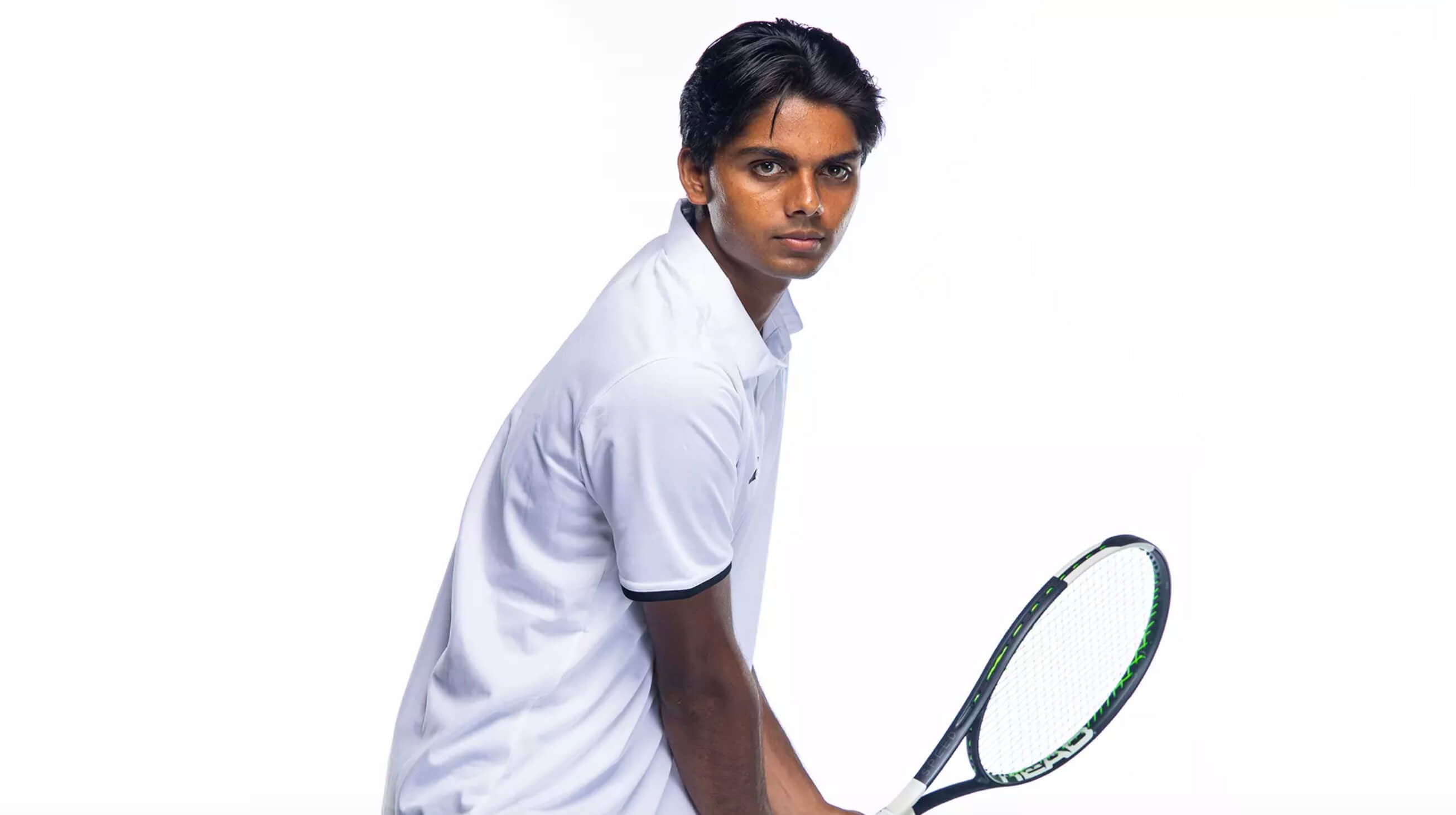 Men's tennis player holding tennis racket