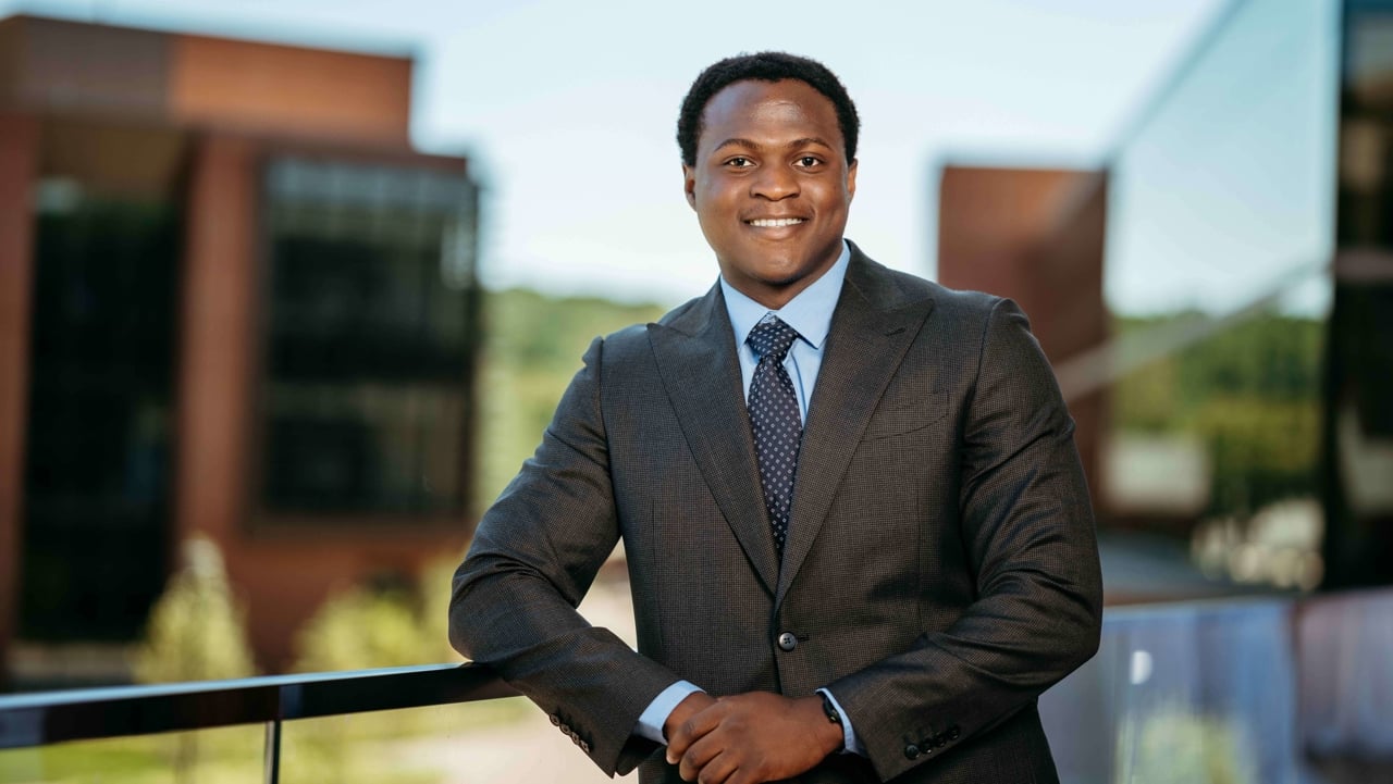 Khalid Abdulraheem, a Sawhney Leadership fellow, poses for a portrait on the balcony of the School of Business on the South Quad.
