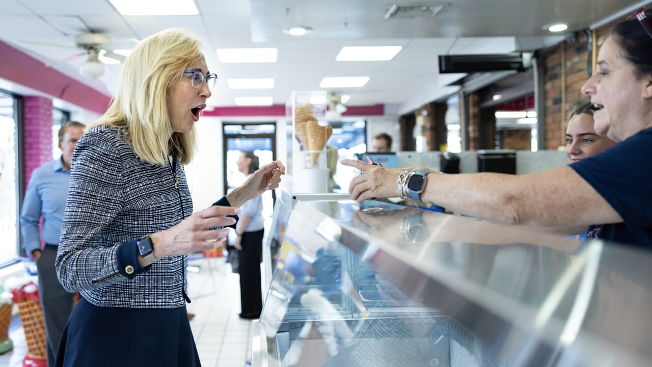 Marie exclaims broadly as staff at Kelly's Cone Connection hand her ice cream