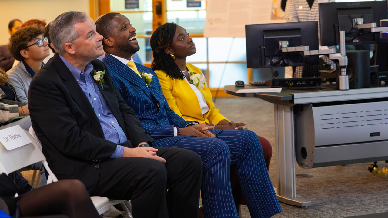 Crowd watches speaker