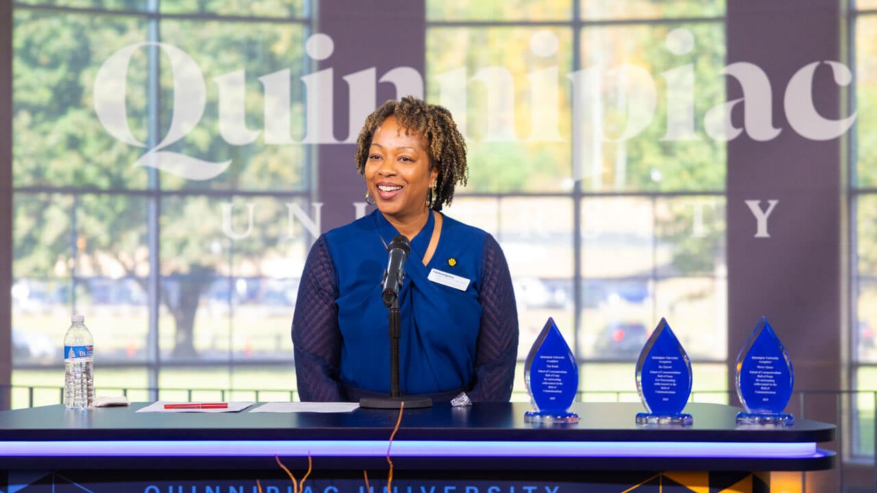 Dean Nadine Barnett Cosby talking to a crowd
