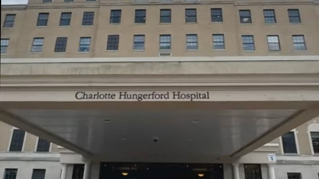 Awning of Charlotte Hungerford entrance, plays video
