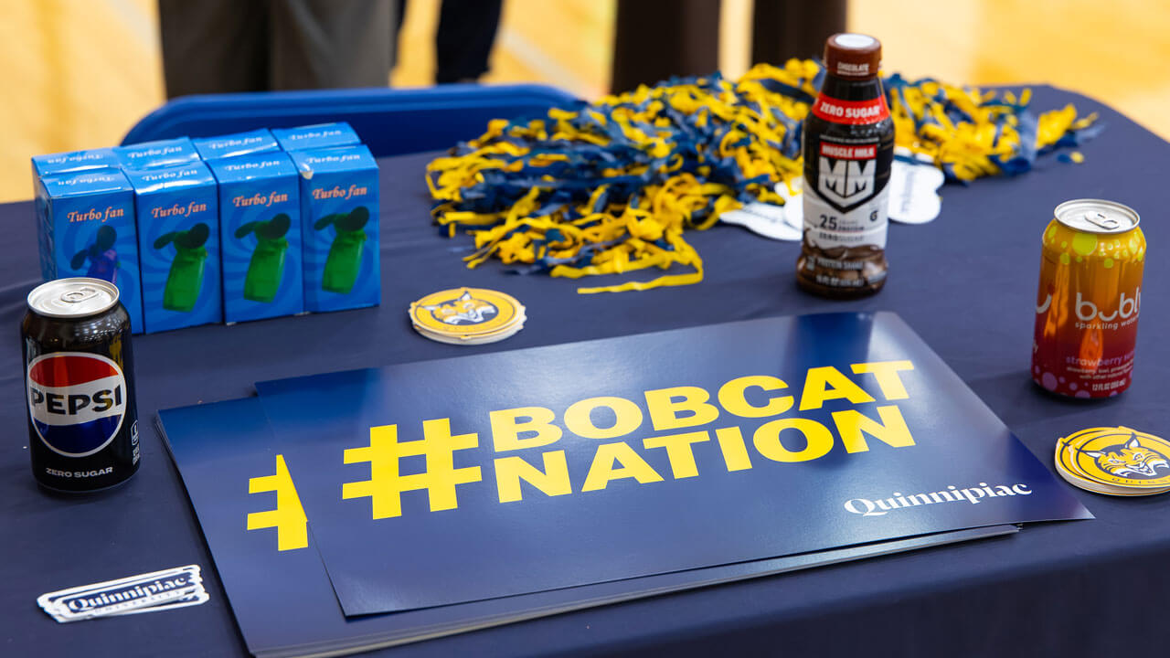 Table spread featuring Pepsi products and a Bobcat Nation sign