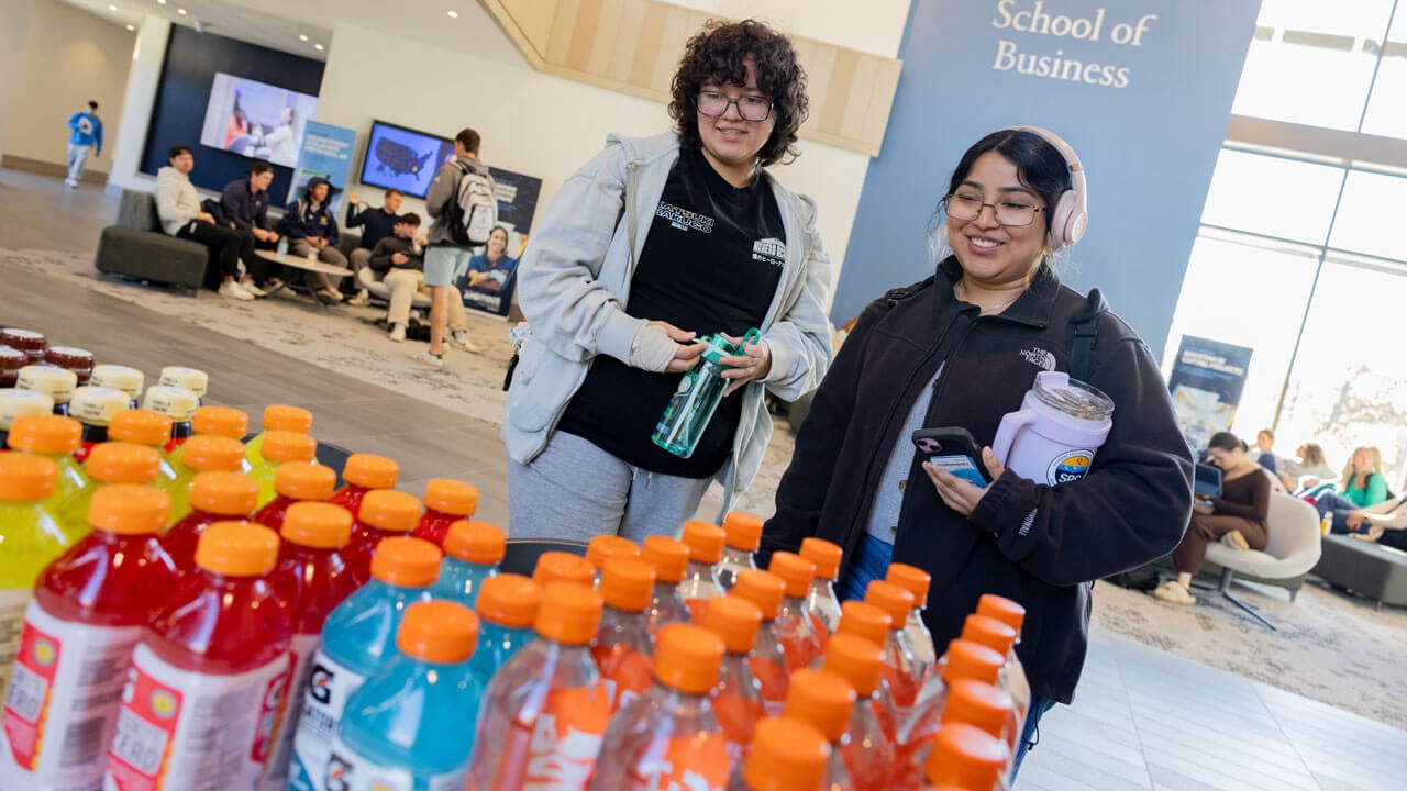 Students explores pepsi products on display