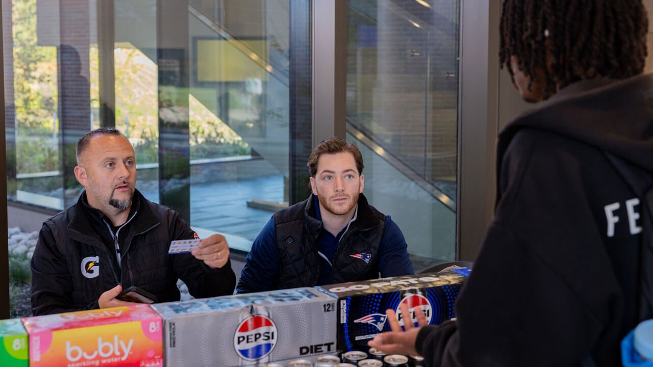 Pepsi workers talk to students