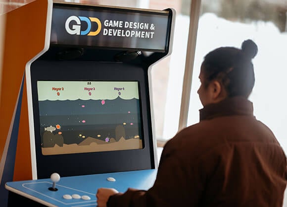 Student at the Game Design showcase
