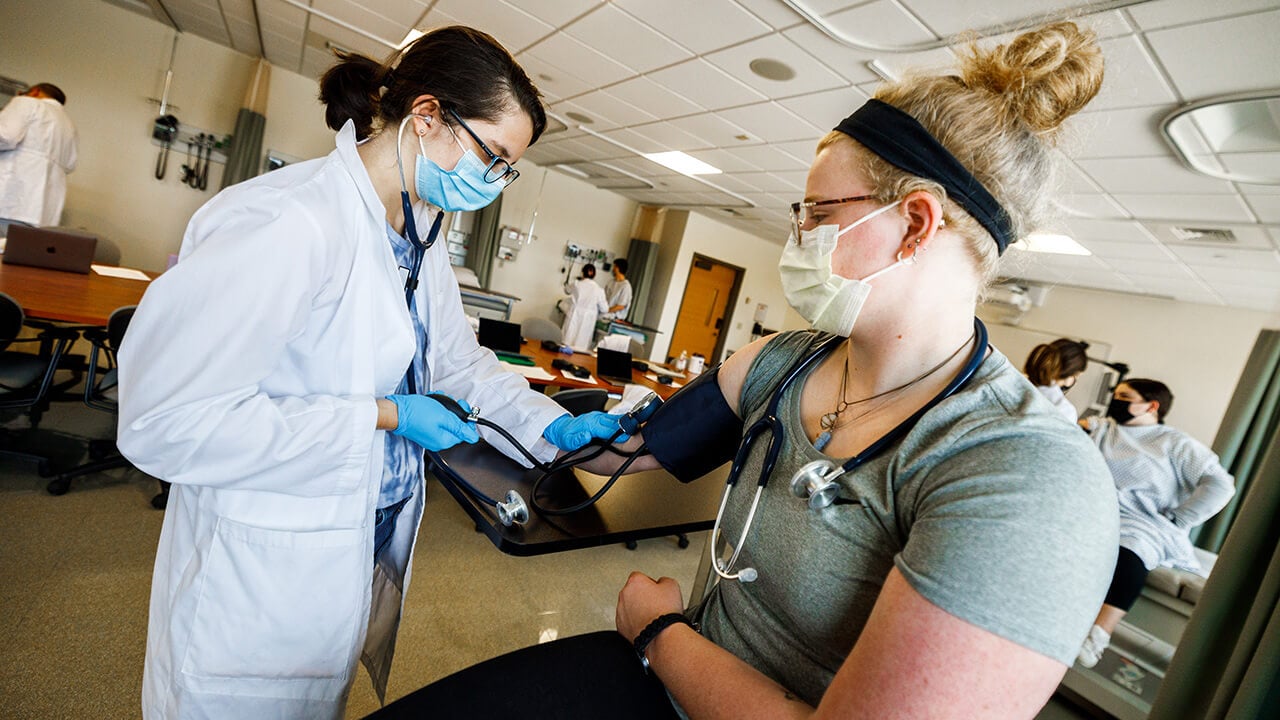 Junior nursing students participate in a health assessment lab on Quinnipiac’s North Haven Campus.