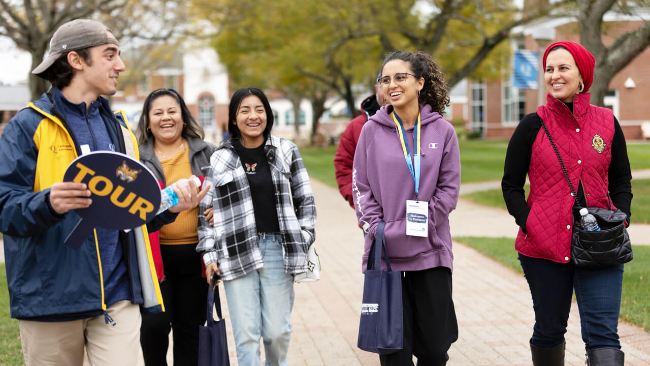Prospective students and their families take a tour of Quinnipiac campuses during Open House