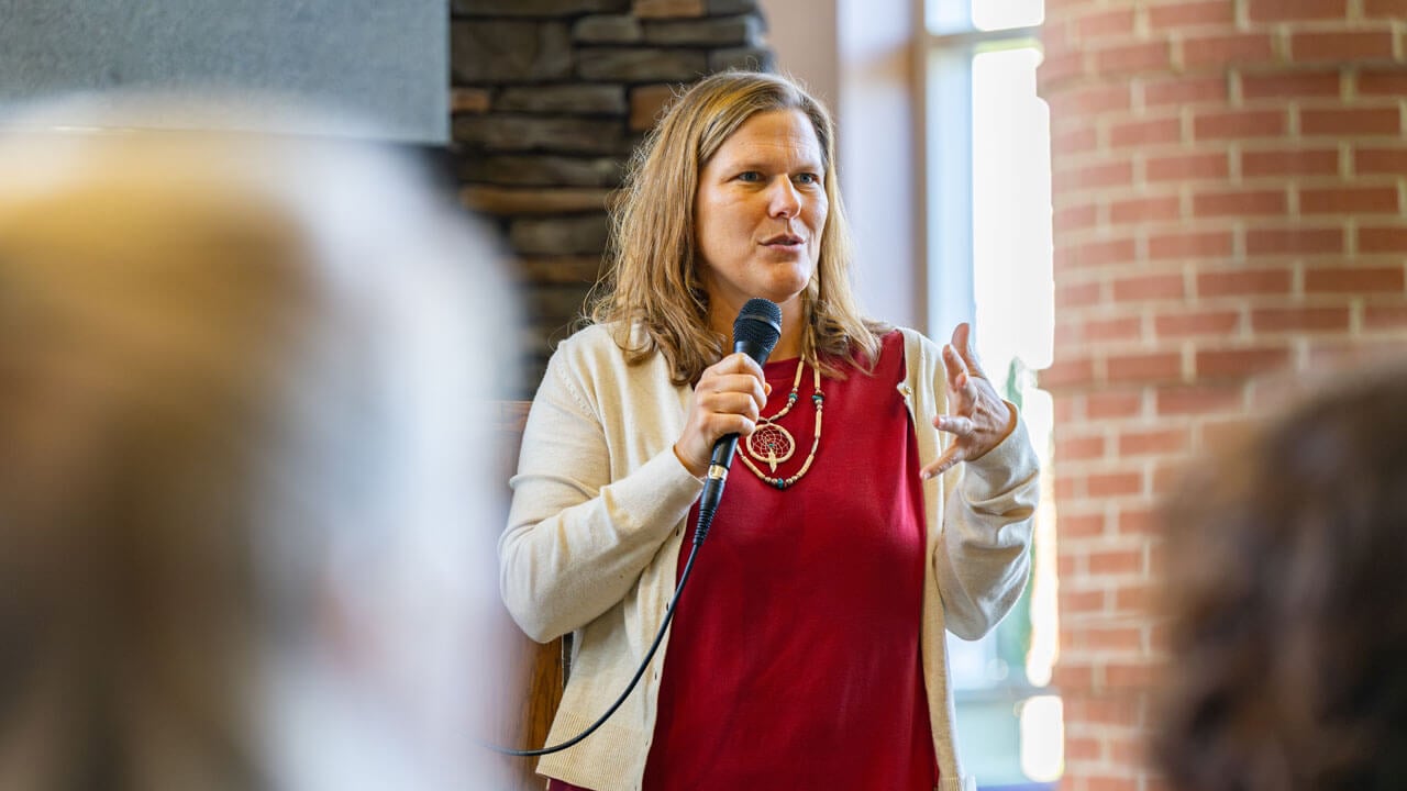 Speaker passionately talking to the audience at the indigeneity initiative teach in