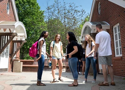 First year students talk outside their residence halls