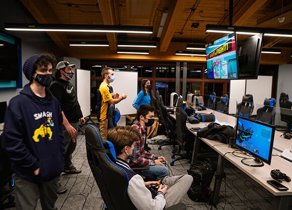Students compete in the eSports lab.