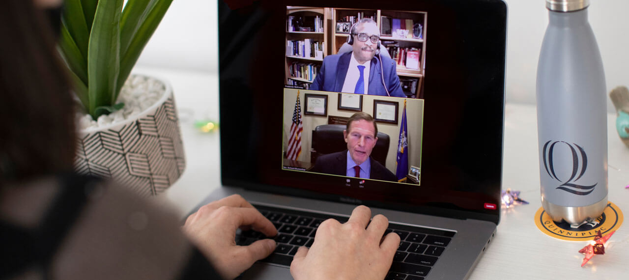 A computer with the virtual conversation with Senator Blumenthal during the Quinnipiac entrepreneurship speaker series