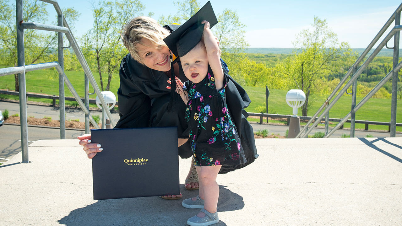 Rebeca Caruso  with her daughter at Quinnipiac University graduation ceremony