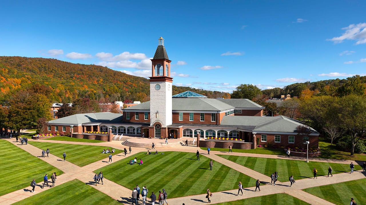 Students walking in campus courtyard, aerial shot