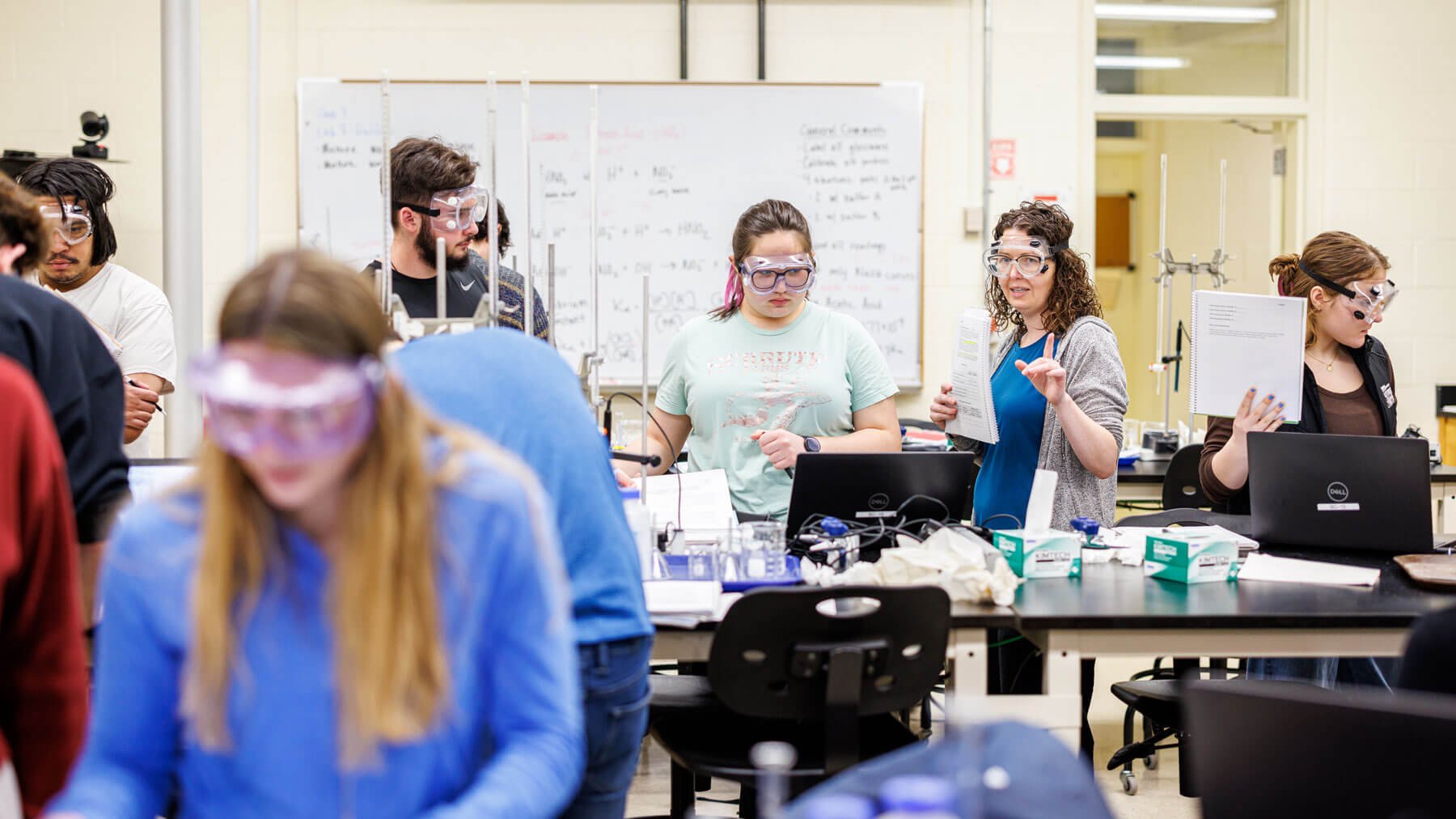 Students participate in a chemistry lab.