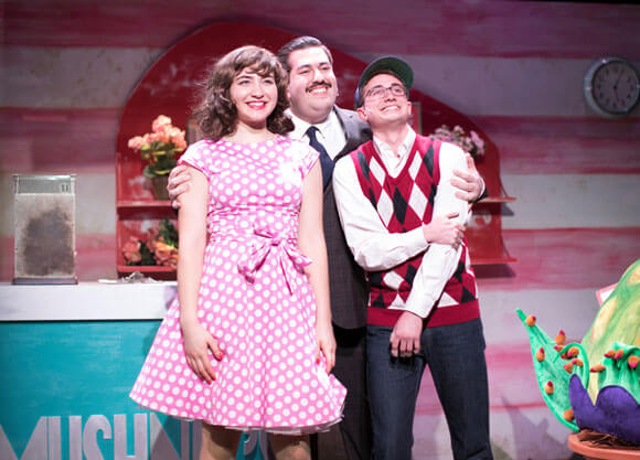 The cast performing the theater production of "Little Shop of Horrors."