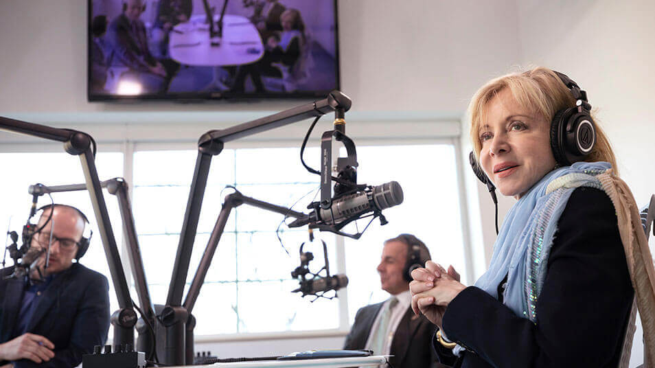 Quinnipiac President Judy Olian is interviewed by David DesRoches inside the Podcast Studio