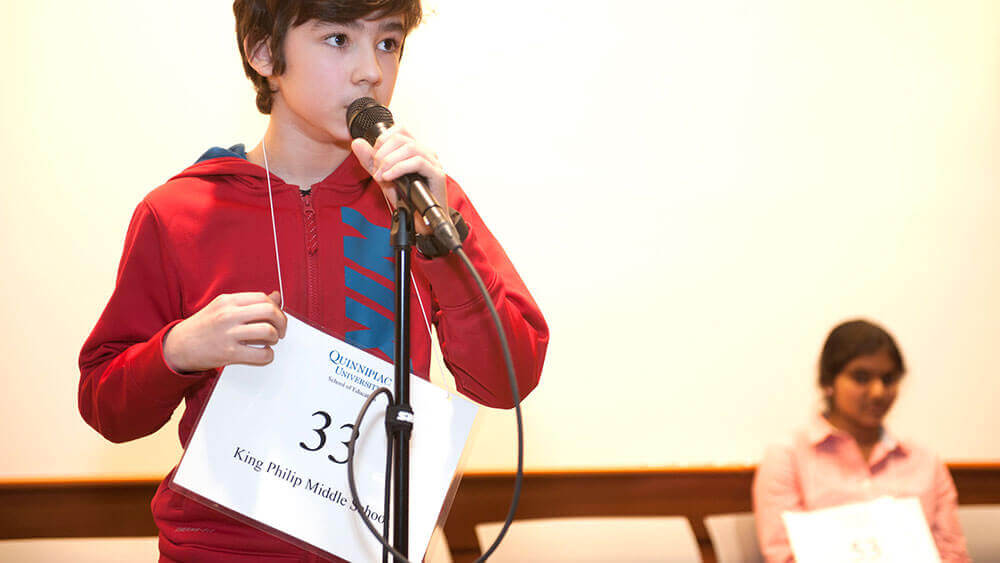A sixth-grader competes in the spelling bee