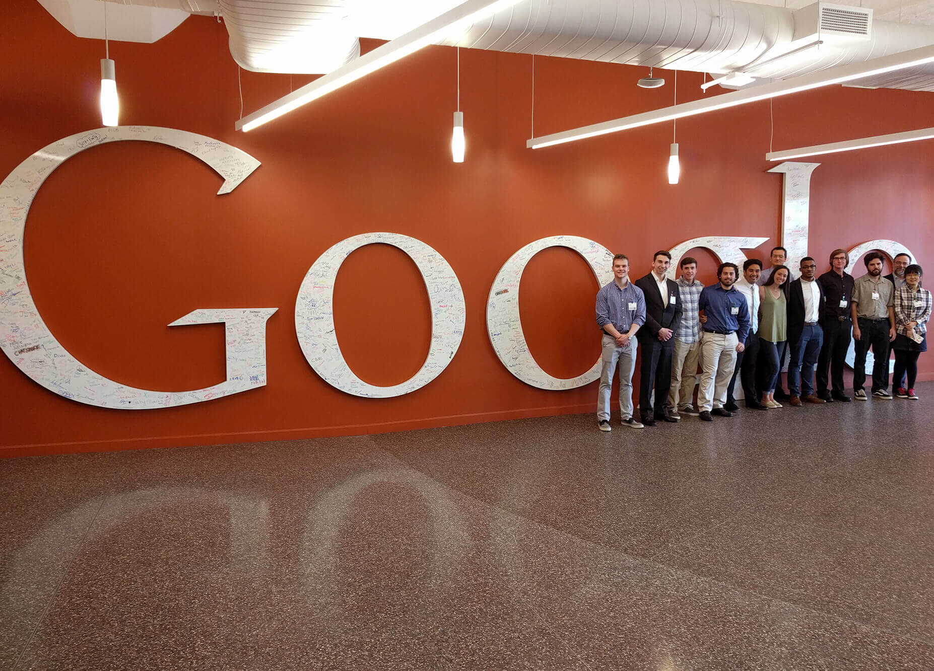 Amanda Kassay '10 leads a group of engineering students on a tour of Google's New York office, where she works as a senior creative engineer.