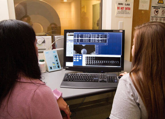 Students learning in the MRI lab.