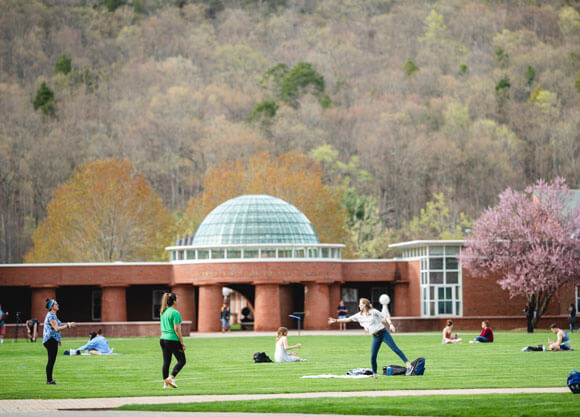 Students hang out on a nice spring day on the quad