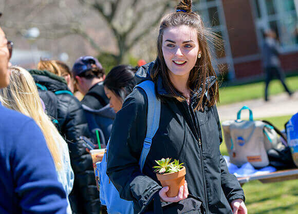 Students smile on the Quad