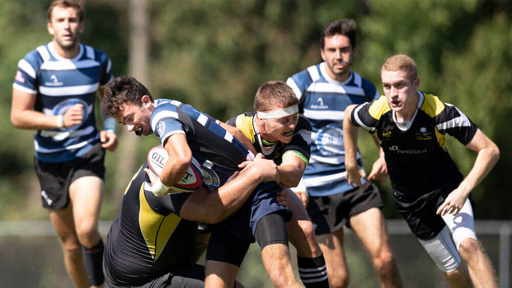 The Quinnipiac University club rugby team takes on Southern Connecticut State University.