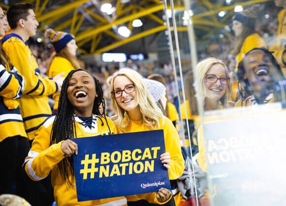 Students cheer at the annual Quinnipiac versus Yale ice hockey game