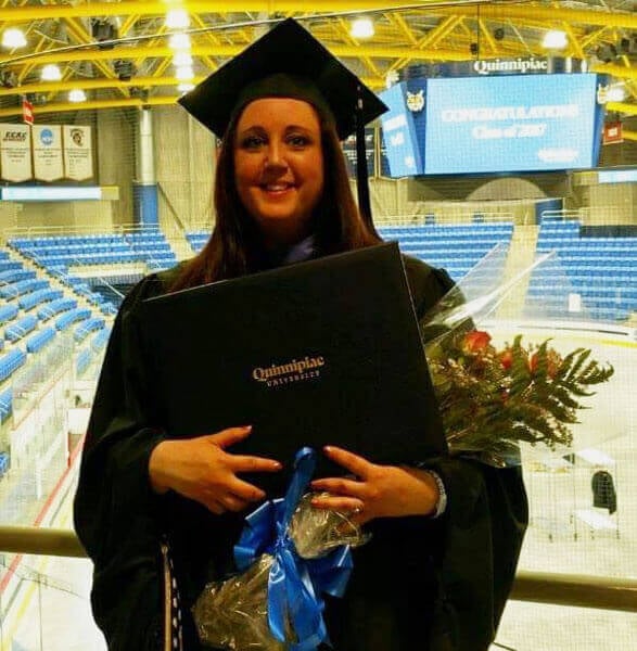 Heather McHugh wearing a cap and gown